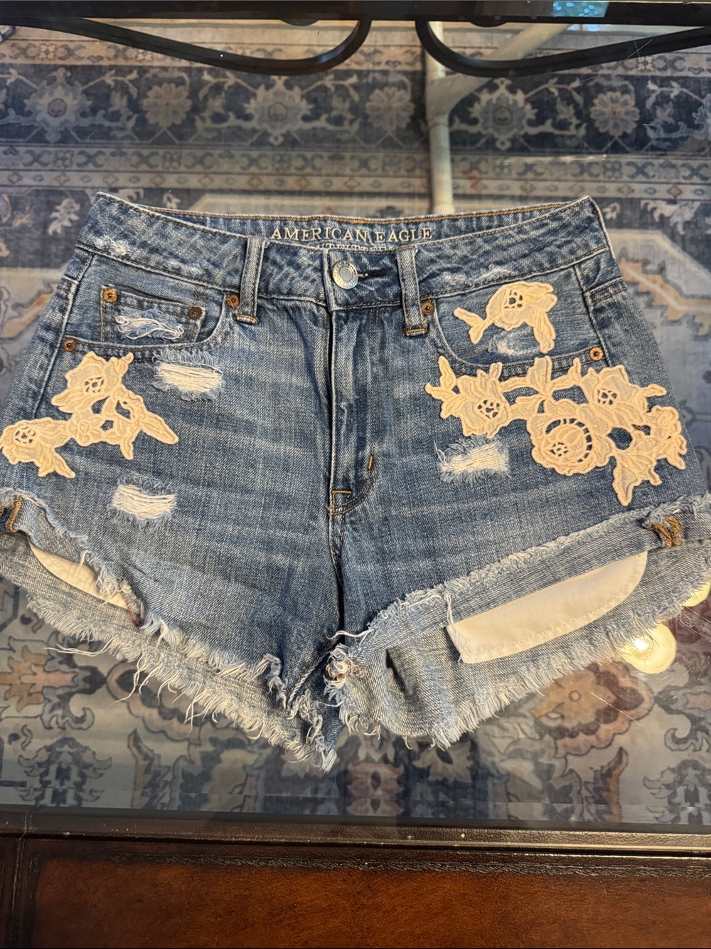 American Eagle Outfitters Distressed Blue Denim Shorts with Cream Floral Lace